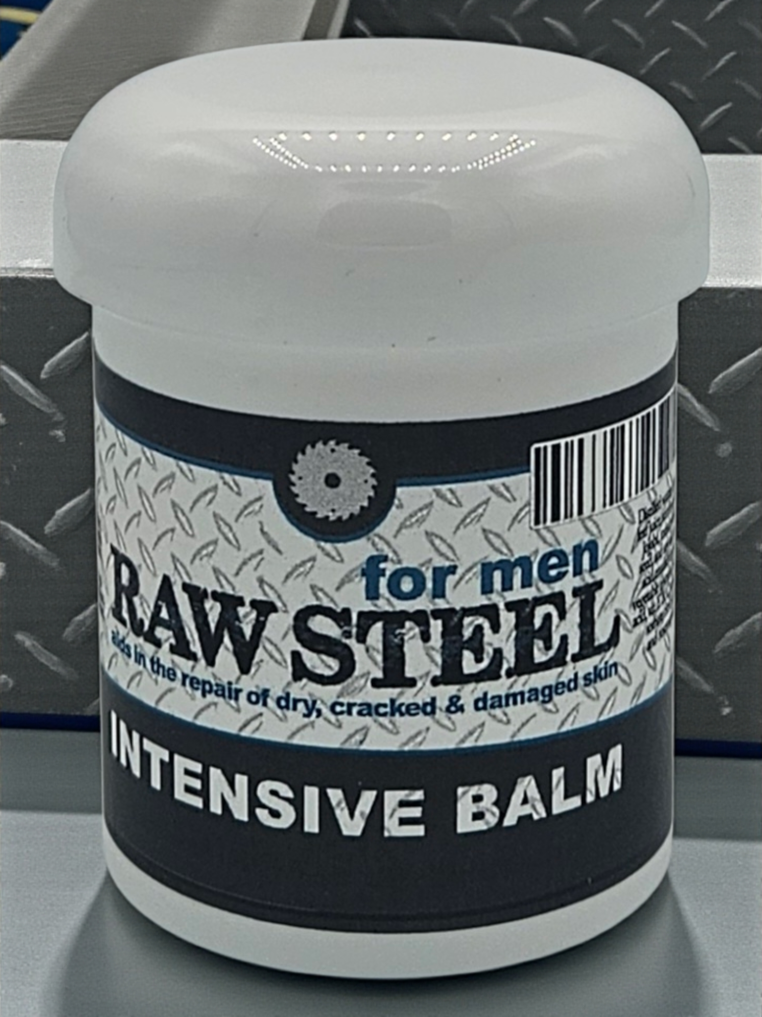 Jar of Raw Steel Intensive Balm for men on a metallic surface