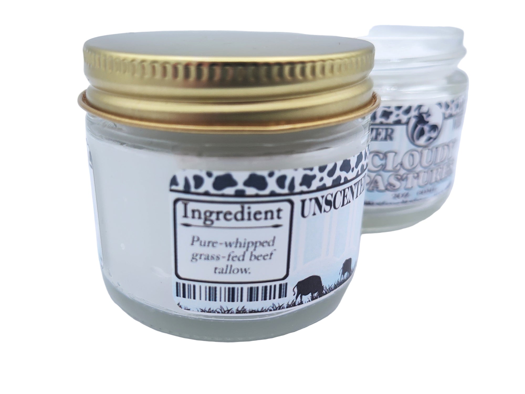 Jar of unscented candle with gold lid on a white background